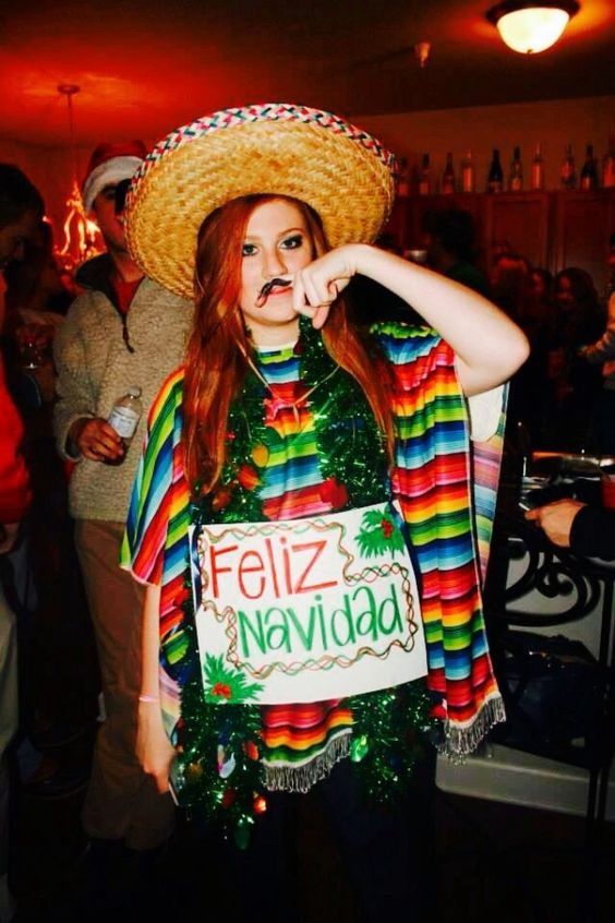 Feliz Navidad Sweater: If you are attending an ugly Christmas sweater party this year, we have got you covered! Here are 25 Ugly Christmas Sweater Ideas for you to use as inspiration.