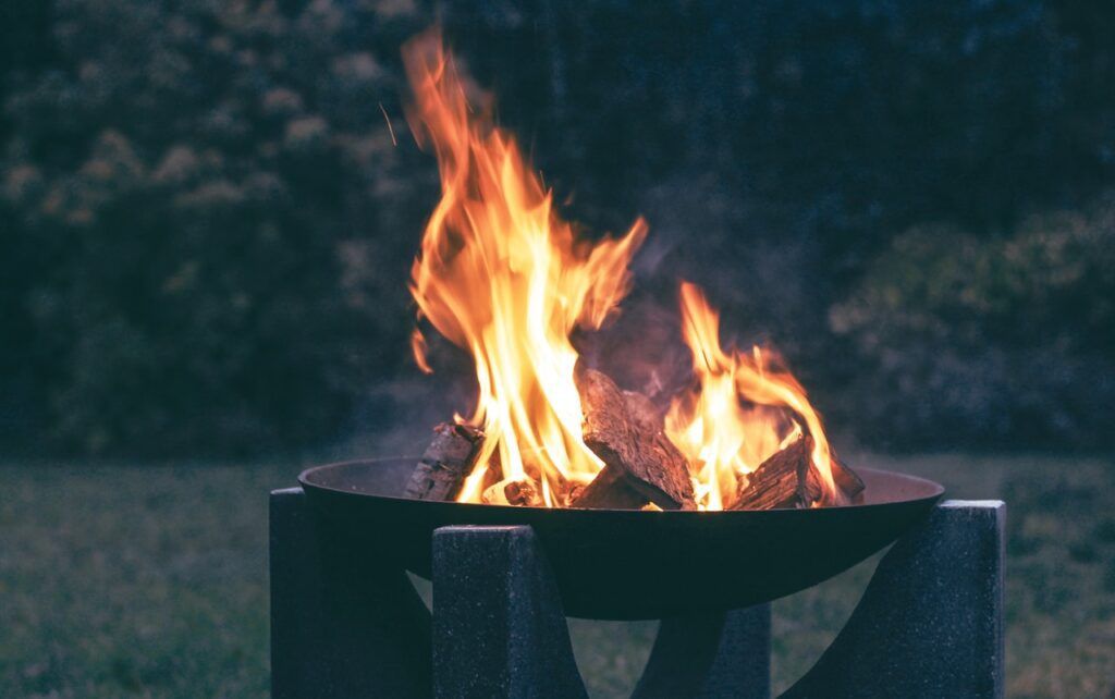 metal fire pit in the woods